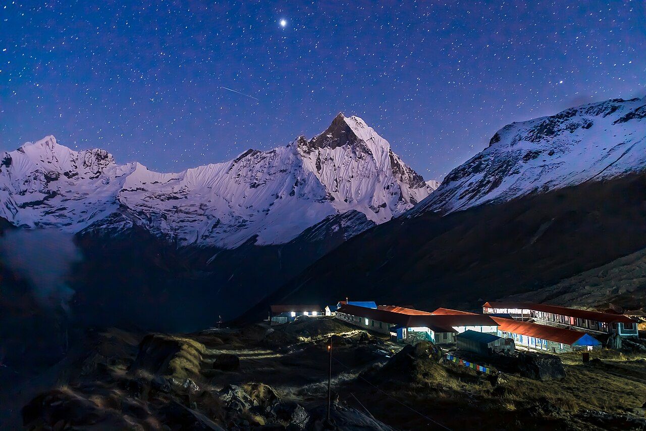 Annapurna Base Camp at night below Machapuchare