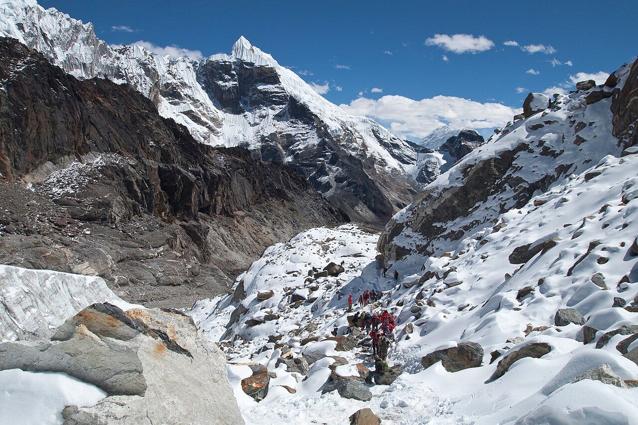 Trekkers crossing the snow of Cho La pass