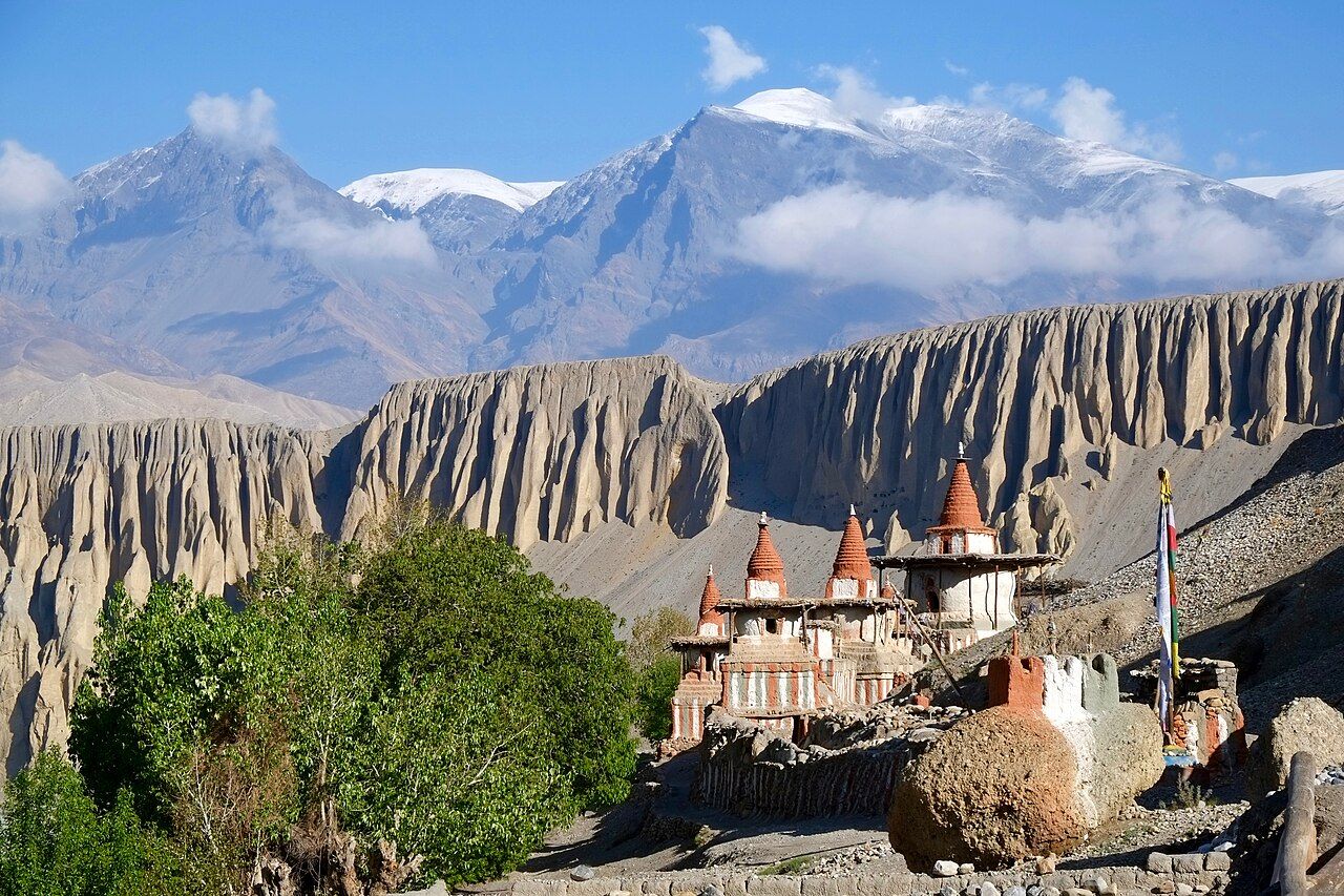 The eroded cliffs and village of Tangye